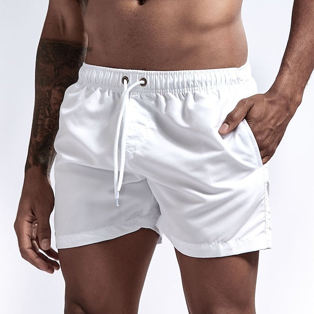 Einfarbige Strandshorts mit Kordelzug für Männer, bequem und vielseitig für Sommertage.