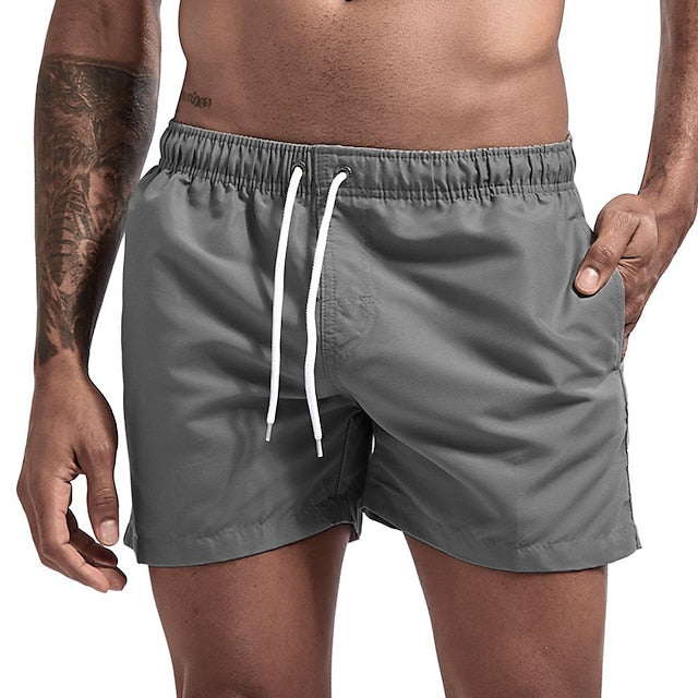 Einfarbige Strandshorts mit Kordelzug für Männer, bequem und vielseitig für Sommertage.
