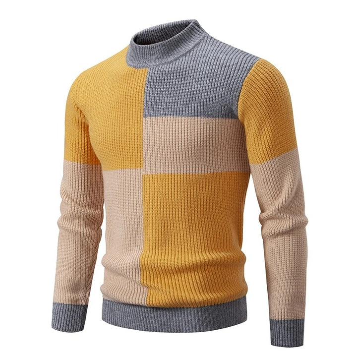 Farbiger Rollkragenpullover für Männer aus weichem Strickmaterial, ideal für die kalte Jahreszeit.