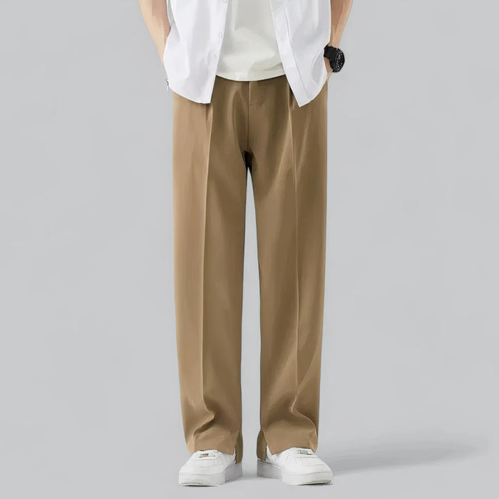 Mann trägt eine Sommerhose mit weitem Bein in einem entspannten Streetwear-Outfit