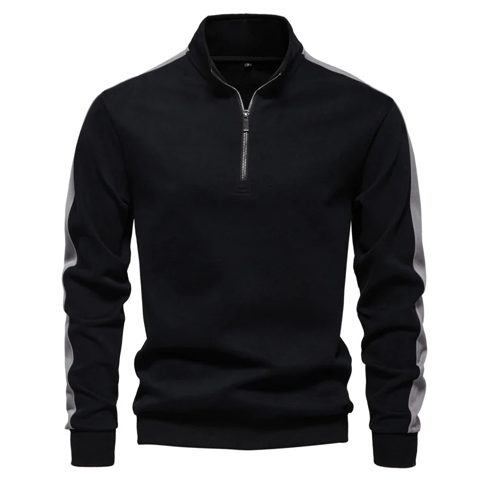 Moderner Herrenpullover aus weichem Material mit Viertelreißverschluss und elegantem Schnitt.