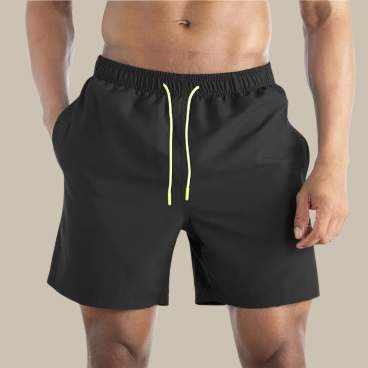 Schnell trocknende Herren-Badeshorts, sportlich und bequem für Strand und Pool.