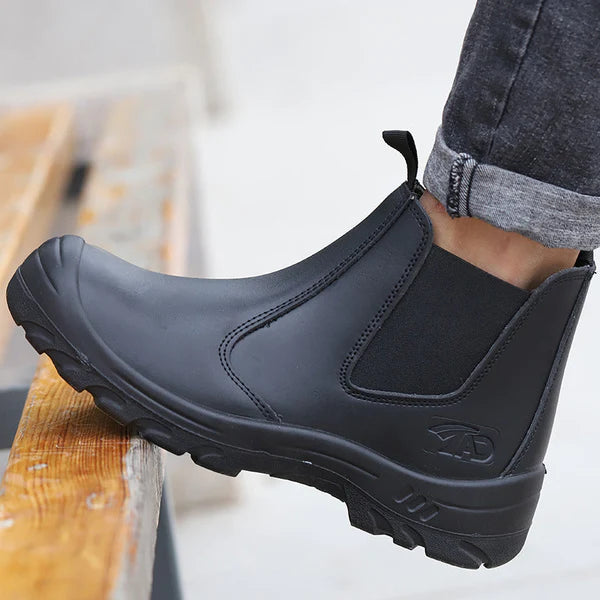 Wasserdichte Arbeitsstiefel für Männer – ideal für Regen und kalte Wintertage.