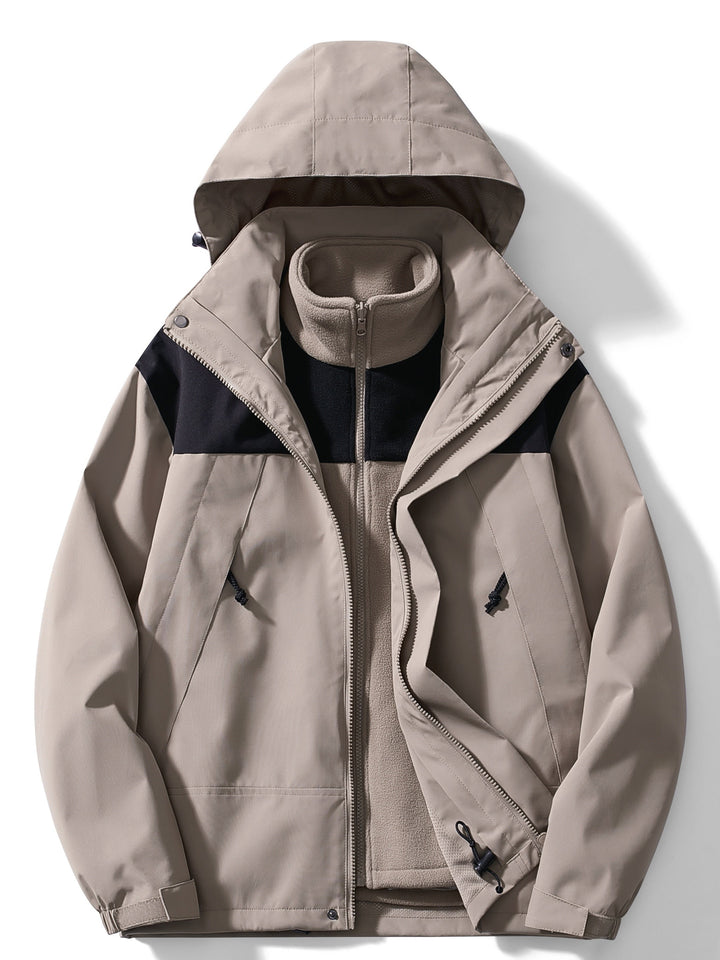 Wasserdichte warme 3-Lagen-Winterjacke, schützt vor Kälte und Nässe bei extremem Wetter.